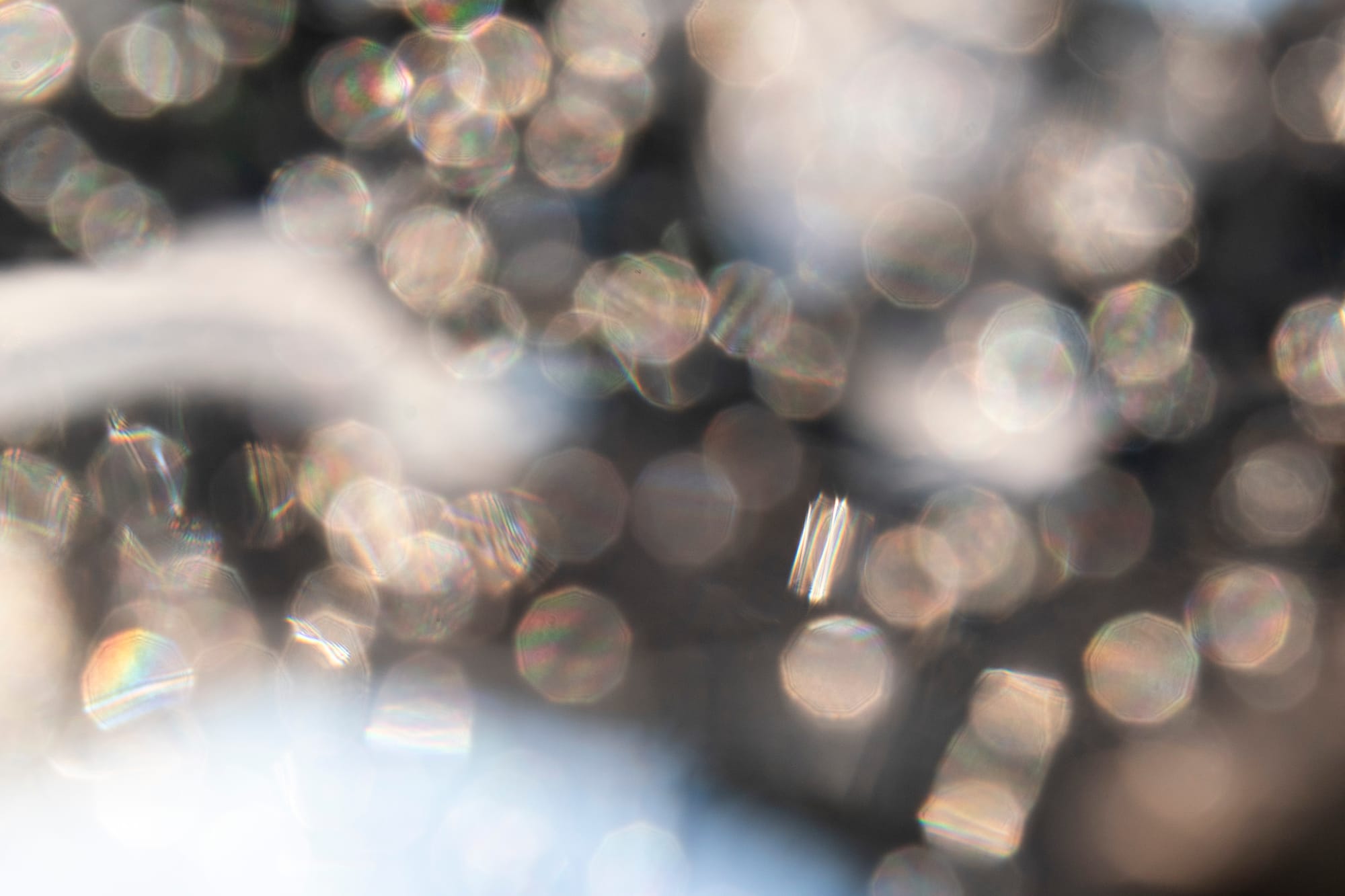 Sunlight glimmers as it passes through ice formed by Lake Superior in Duluth, Minn. 