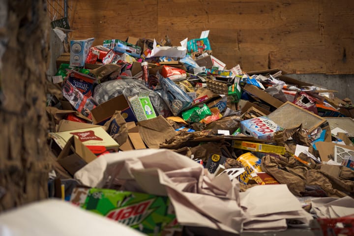 Cardboard boxes and paper are seen in a bunker at the Otter Tail County Recycling Center. 